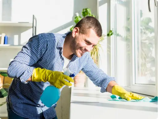 Professional cleaner wiping a surface